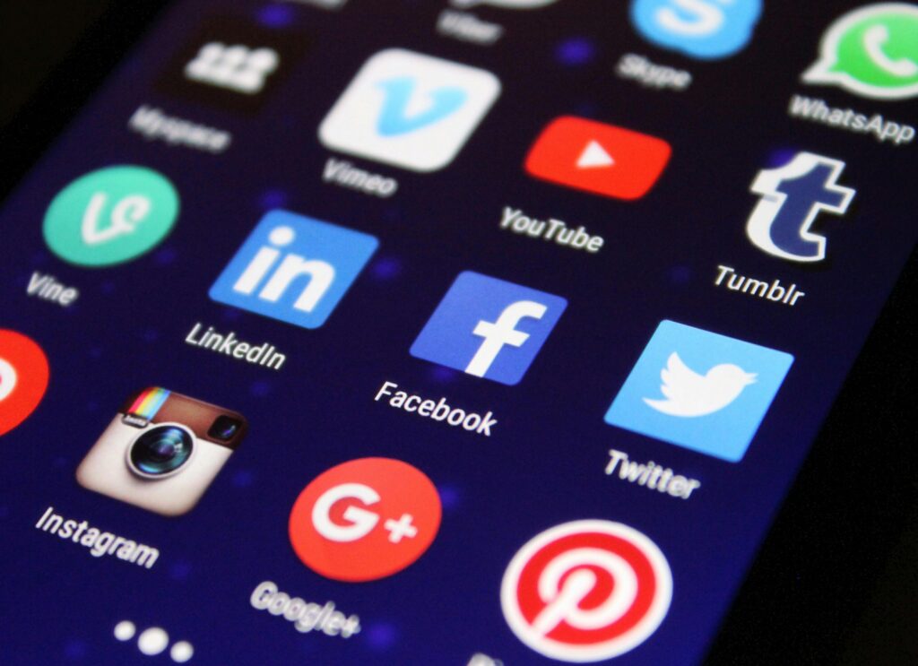 pexels photo 267350 267350 Close-up of a smartphone screen showing various social media app icons such as Facebook and Twitter.